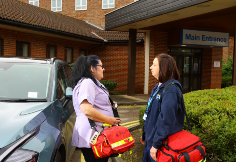 cPicture shows two women about to go out to help people in the community