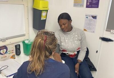 patient getting seen by a nurse